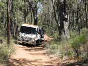 1298951916_truck_coming_out_of_bush