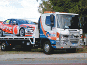 vodaphone v8 supercar on quality towing truck perth